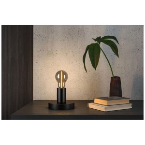 Paulmann LED-Birne E27 Rauchglas, warmweißes Licht, dekorative Tischleuchte im Hintergrund.