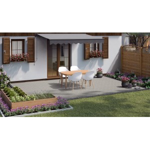 Pavés autobloquants en béton Double T standard sur terrasse avec mobilier de jardin et plantes.