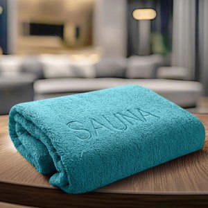 Serviette de sauna turquoise (70x200 cm) en coton avec inscription "Sauna".